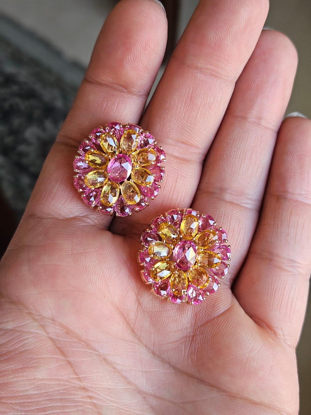 A very special and gorgeous, Yellow Sapphire & Pink Sapphire Earrings set in 18K Rose Gold. The weight of the Yellow Sapphires is 7.28 carats. The Yellow Sapphires are of Ceylon (Sri Lanka) origin. The weight of the Pink Sapphires is 9.65 carats.
