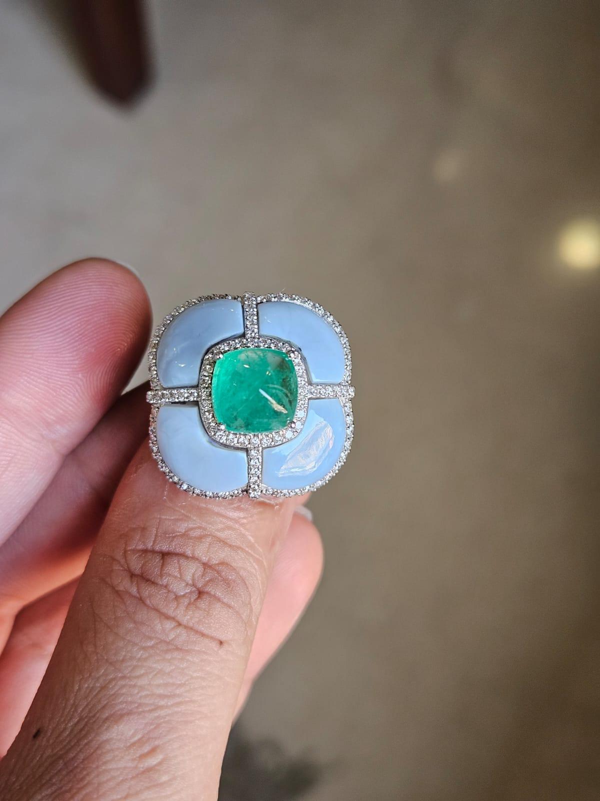 A very gorgeous and beautiful, modern style, Emerald & Blue Opal Cocktail Dome Ring set in 18K White Gold & natural Diamonds. The weight of the Emerald Sugarloaf is 3.61 carats. The Emerald is completely natural, without any treatment and is of