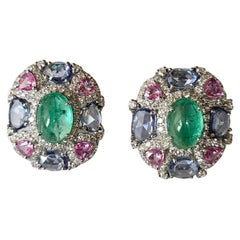 Set in 18K Gold, Emerald Cabochon, Blue 
Pink Sapphires 
Diamonds Stud Earring