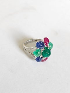 Set in 18K Gold, Emerald cabochon, Blue Sapphires, Ruby & Diamonds Cocktail Ring