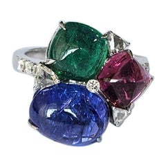 Set in 18K Gold, Emerald, Rubellite, Tanzanite sugarloaf & Diamond Cocktail Ring