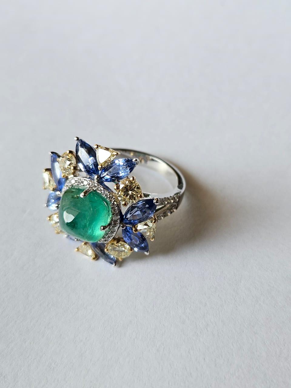 Sugarloaf Cabochon Set in 18K Gold, Emerald sugarloaf, Blue Sapphires & Diamonds Cocktail Ring For Sale