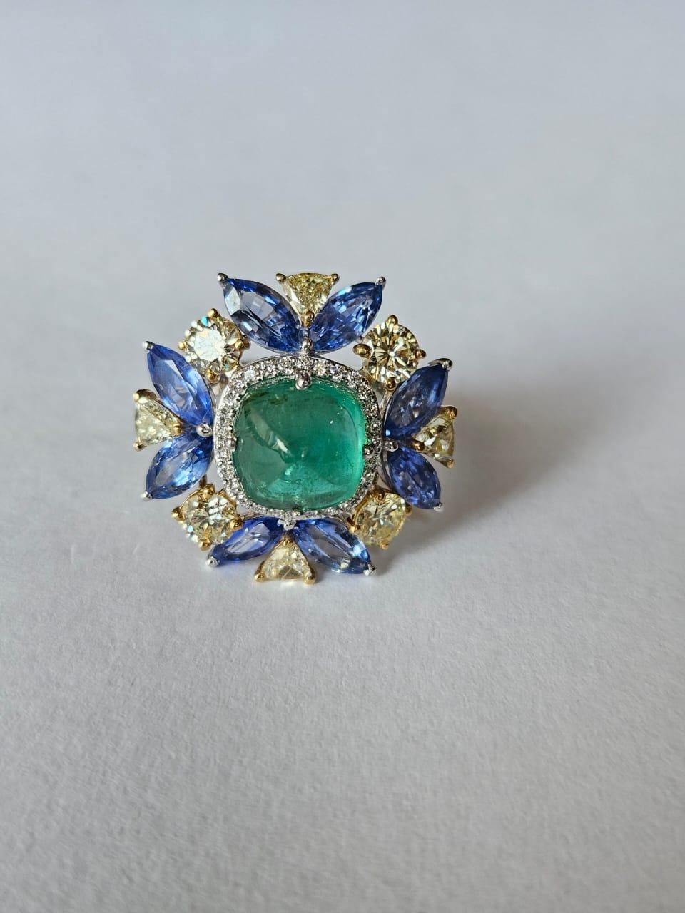 Set in 18K Gold, Emerald sugarloaf, Blue Sapphires & Diamonds Cocktail Ring In New Condition For Sale In Hong Kong, HK