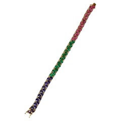 Set in 18K Gold, Emeralds, Pink Sapphires, Tanzanites & Diamonds Modern Bracelet