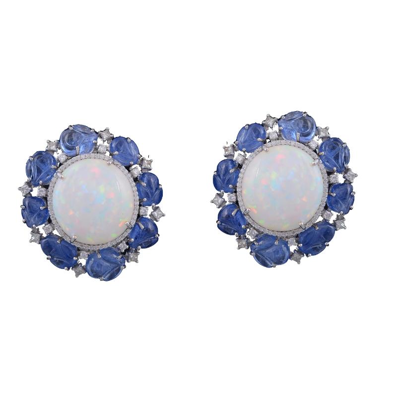 One of its kind, Ethiopian Opal and Burma Blue Sapphire Earrings, that can be worn as studs or as dangler earrings. The opal, Ethiopian in origin, weighs 32.53 carats and the weight of the carved Blue Sapphires is 35.77 carats. The leaf carved