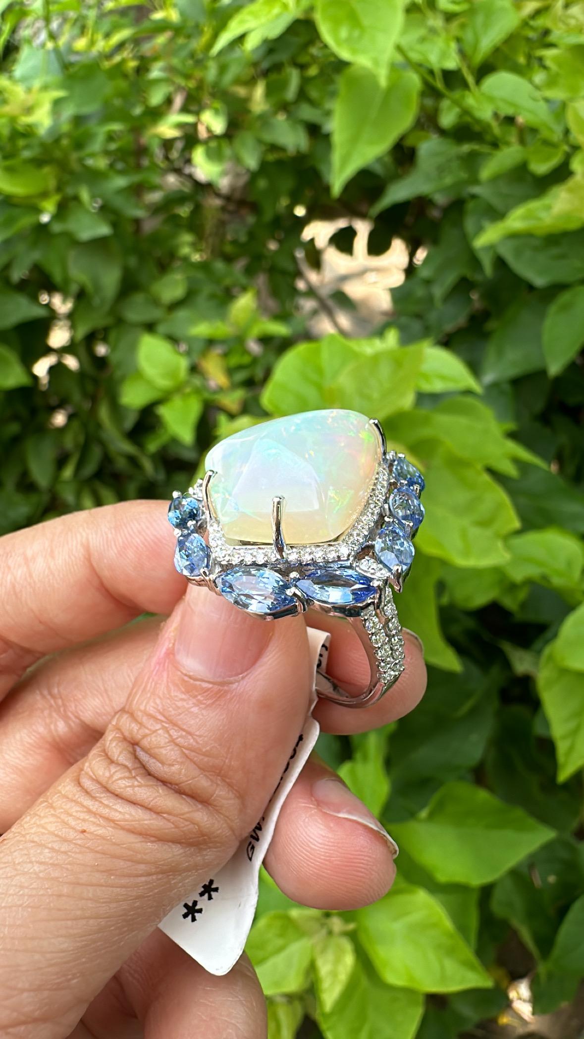 Modern Set in 18K Gold, Ethiopian Opal, Blue Sapphires & Diamonds Cocktail Dome Ring For Sale