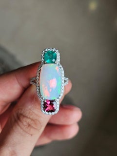 Set in 18K Gold, Ethiopian Opal, Emerald, Rubellite & Diamonds Cocktail Ring