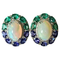 Set in 18K Gold, Ethiopian Opal, Emerald, Tanzanite 
Diamonds Stud Earrings