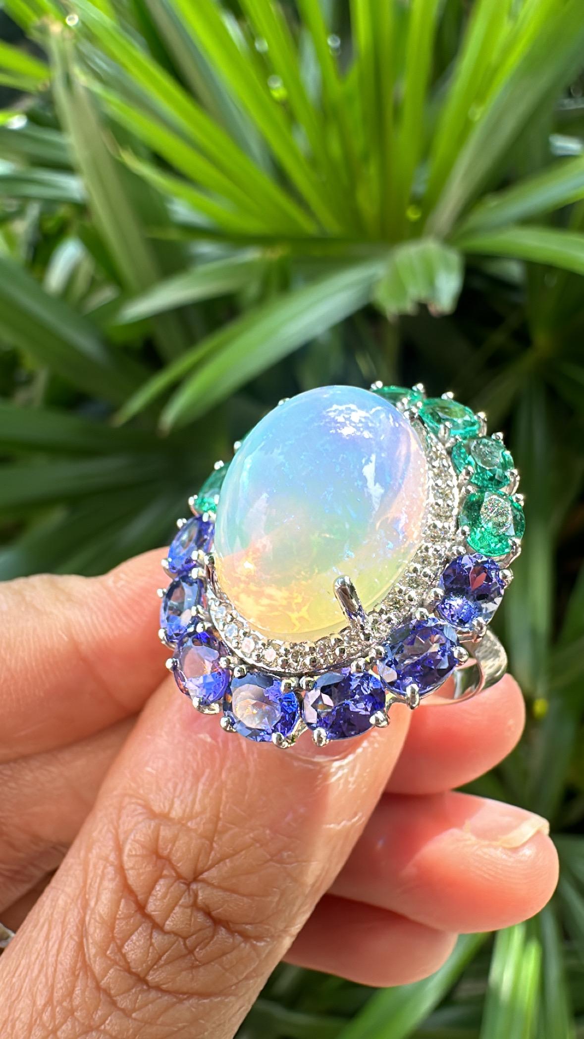 Modern Set in 18K Gold, Ethiopian Opal, Emeralds, Tanzanites & Diamonds Cocktail Ring For Sale