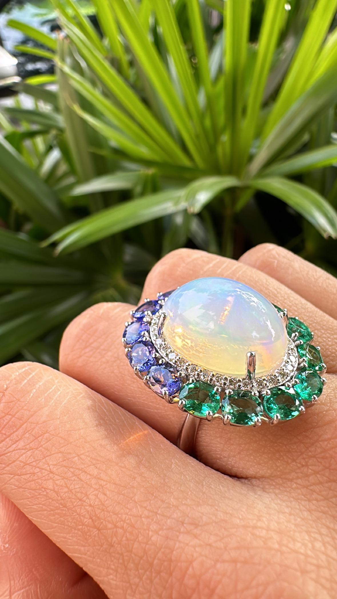 Set in 18K Gold, Ethiopian Opal, Emeralds, Tanzanites & Diamonds Cocktail Ring In New Condition For Sale In Hong Kong, HK