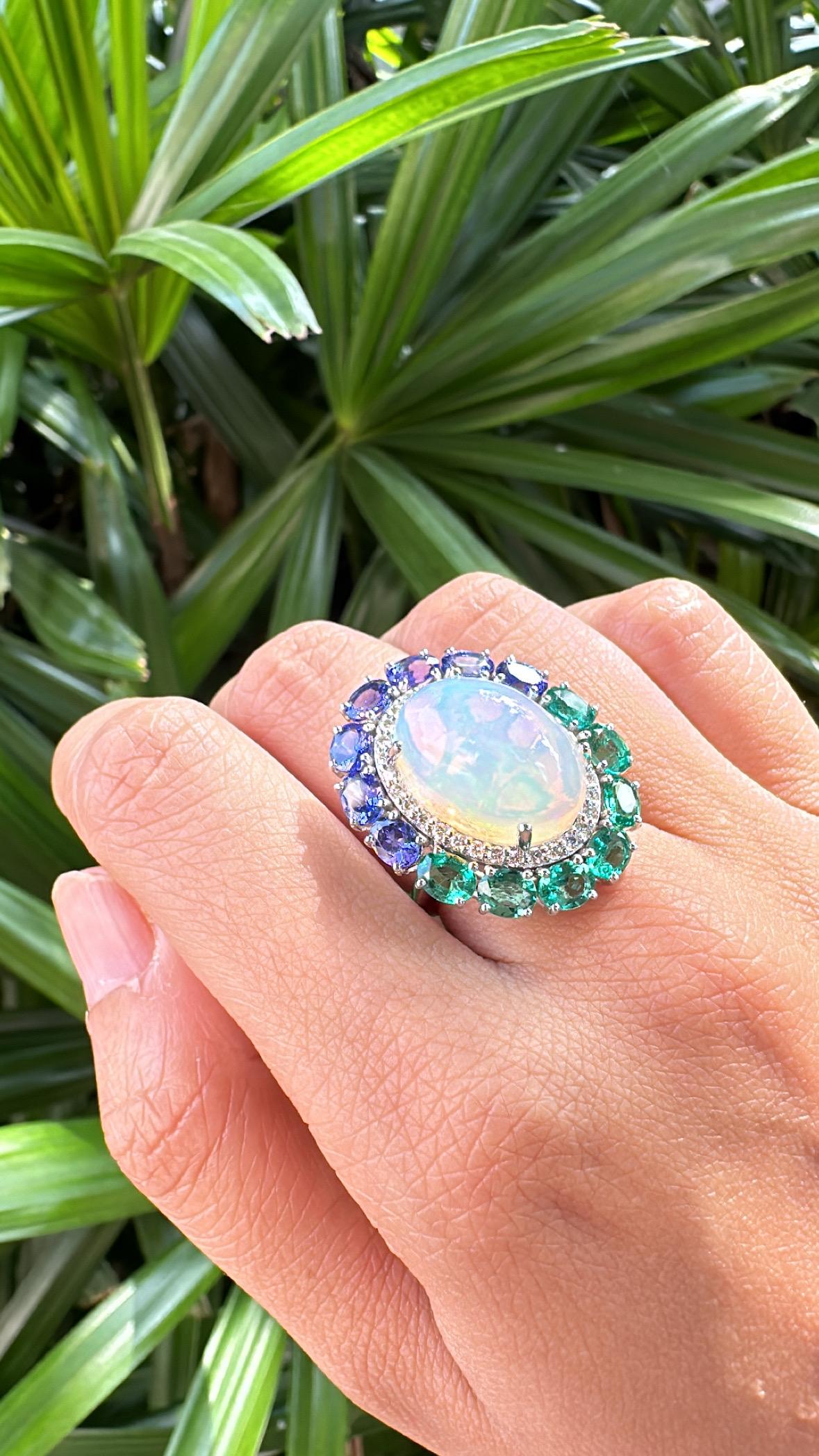 Set in 18K Gold, Ethiopian Opal, Emeralds, Tanzanites & Diamonds Cocktail Ring For Sale 1