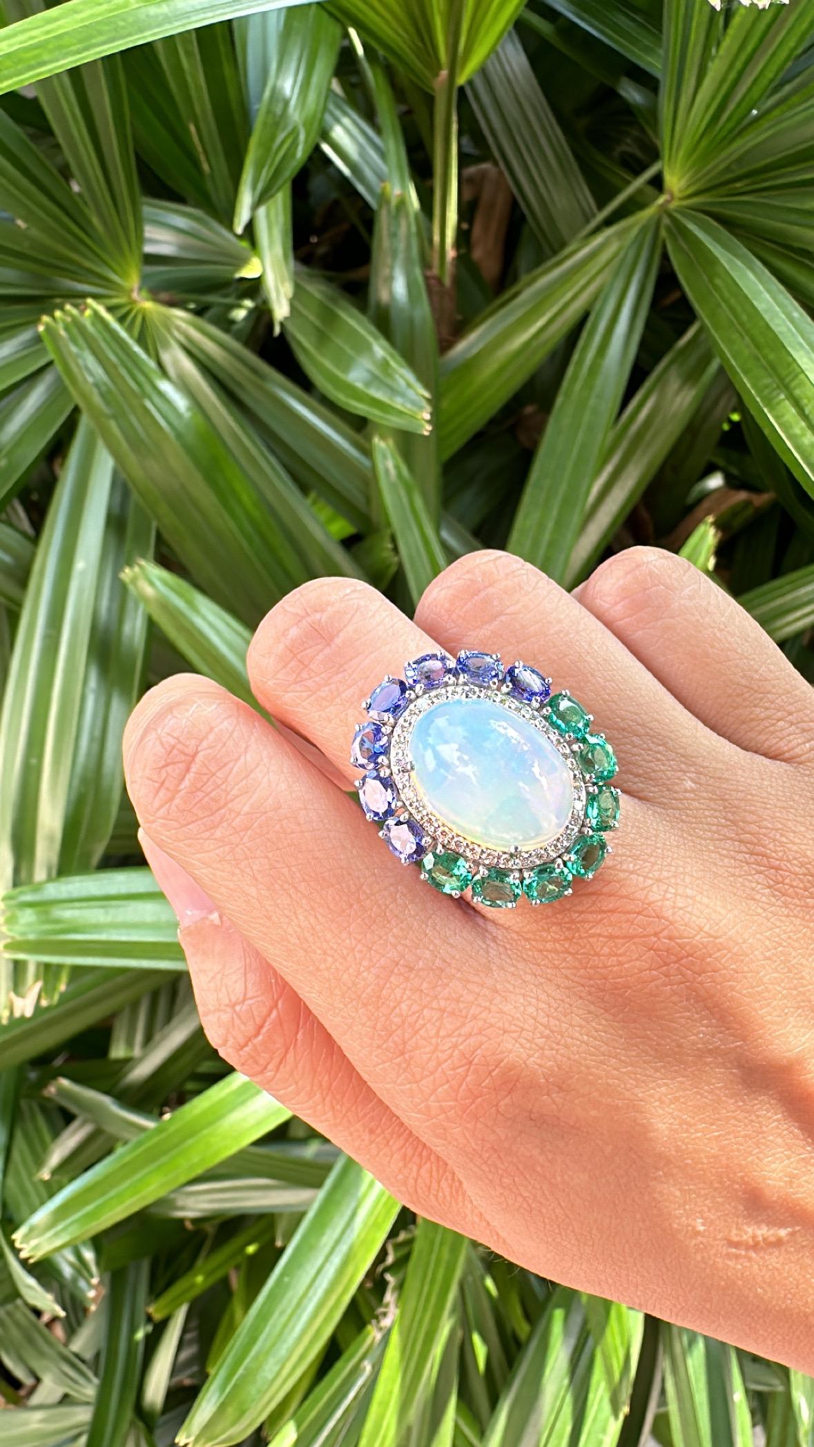 Set in 18K Gold, Ethiopian Opal, Emeralds, Tanzanites & Diamonds Cocktail Ring For Sale 2
