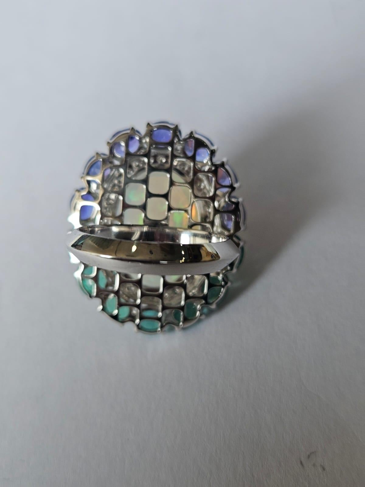 Set in 18K Gold, Ethiopian Opal, Emeralds, Tanzanites & Diamonds Cocktail Ring For Sale 3