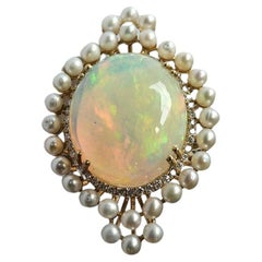 Set in 18K Gold, Ethiopian Opal, Freshwater Pearls 
Diamonds Cocktail Ring