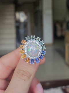 Set in 18K Gold, Ethiopian Opal, Multi Sapphires & Diamonds Cocktail Dome Ring