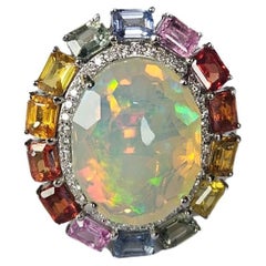 Cocktailring aus 18 Karat Gold, äthiopischem Opal, mehreren Saphiren und Diamanten