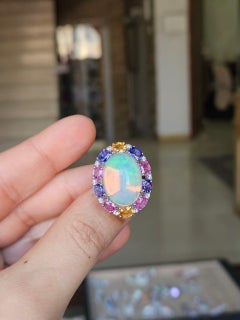 Set in 18K Gold, Ethiopian Opal, Multi Sapphires, Tanzanite & Diamonds Dome Ring