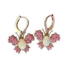 Set in 18K gold, Ethiopian Opal, Pink Sapphires & Diamonds Dangle Earrings