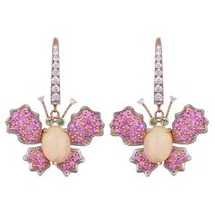 Set in 18K gold, Ethiopian Opal, Pink Sapphires & Diamonds Dangle Earrings