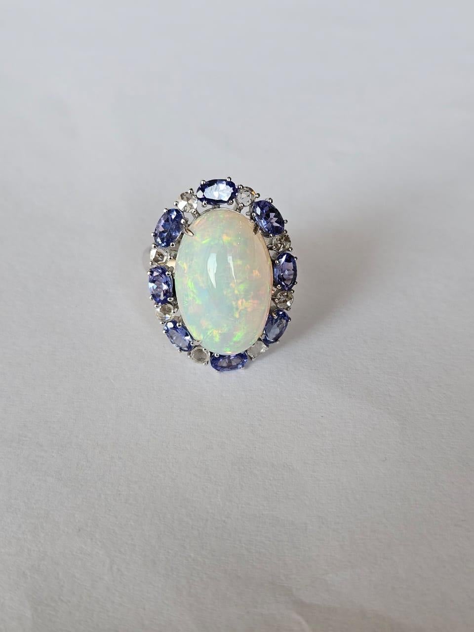 Set in 18K Gold, Ethiopian Opal, Tanzanite & Diamonds Cocktail Engagement Ring In New Condition For Sale In Hong Kong, HK