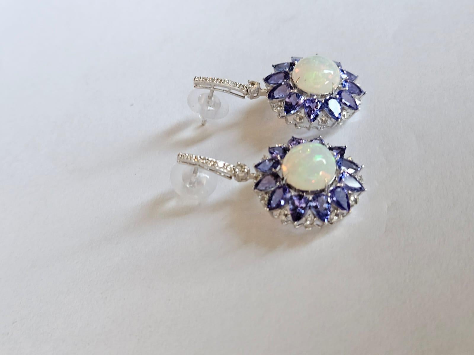 Cabochon Set in 18K Gold, Ethiopian Opal, Tanzanite & Rose Cut Diamonds Dangle Earrings For Sale