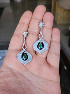 Ohrhänger aus 18 Karat Gold, Perlmutt, schwarzem Onyx, Smaragd und Diamanten