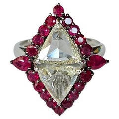 Set in 18K Gold, Mozambique Rubies & trillion Rose cut Diamonds Engagement Ring