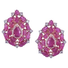 white gold earrings studs Set in 18 Karat Gold, Mozambique Ruby and Diamonds Art Deco Style Stud Earrings