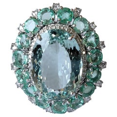Set in 18K Gold, natural Aquamarine, Emerald & Rose Cut Diamonds Cocktail Ring