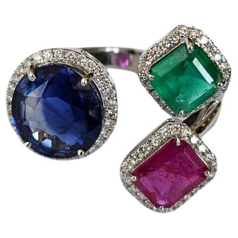 Set in 18K Gold, natural Blue Sapphire, Emerald, Ruby & Diamond Three-Stone Ring For Sale