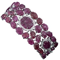 Set in 18K gold, Natural, Carved, Mozambique ruby and Diamonds flexible bracelet