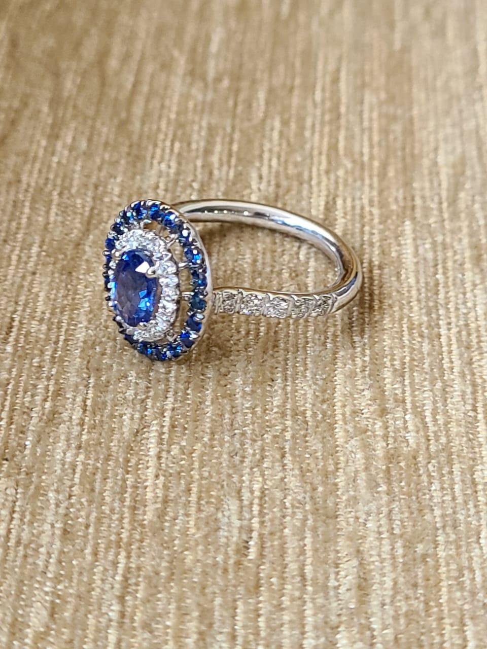 A very cute and dainty Blue Sapphire cocktail ring set in 18K Gold and Diamonds. The combined weight of the Blue Sapphires is weighs 1.52 carats. The Blue Sapphire if of Ceylon (Sri Lanka) origin. The weight of the diamonds is 0.31 carats. The