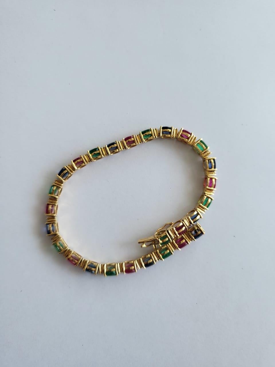 Set in 18k Gold, Natural Emerald, Ruby, Blue Sapphires & Diamond Tennis Bracelet In New Condition For Sale In Hong Kong, HK