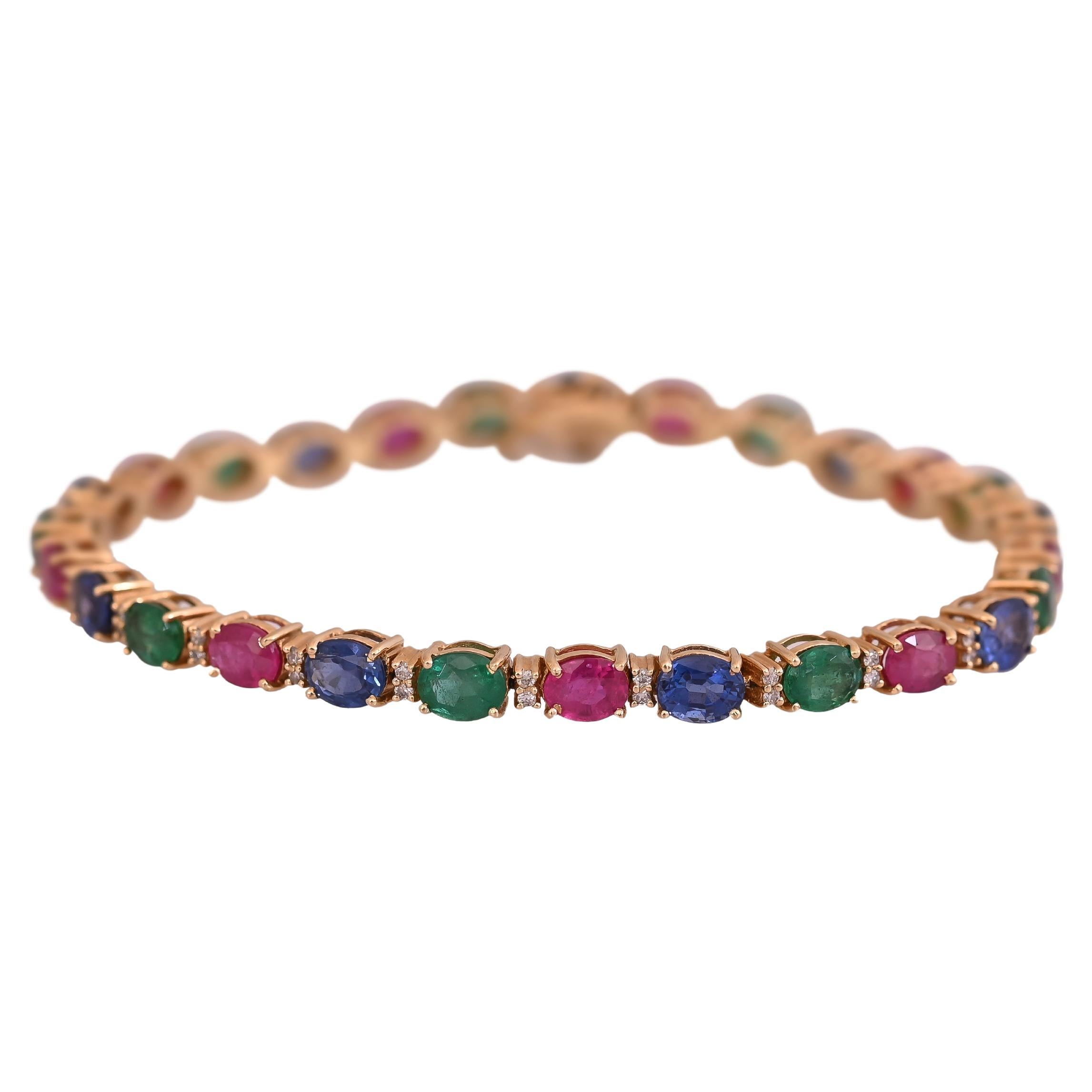 Bracelet tennis en or 18 carats serti d'émeraudes naturelles, de rubis, de saphirs bleus et de diamants
