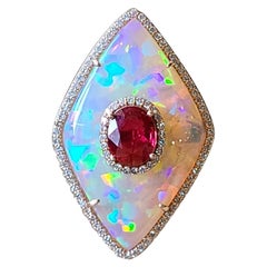 Set in 18K Gold, Natural Ethiopian Opal, Ruby 
Diamonds Cocktail Ring