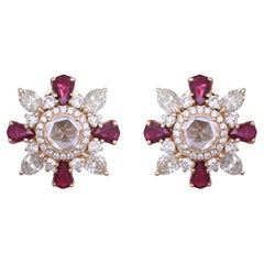 Orecchini con rubini naturali del Mozambico e diamanti taglio rosa, incastonati in oro 18K