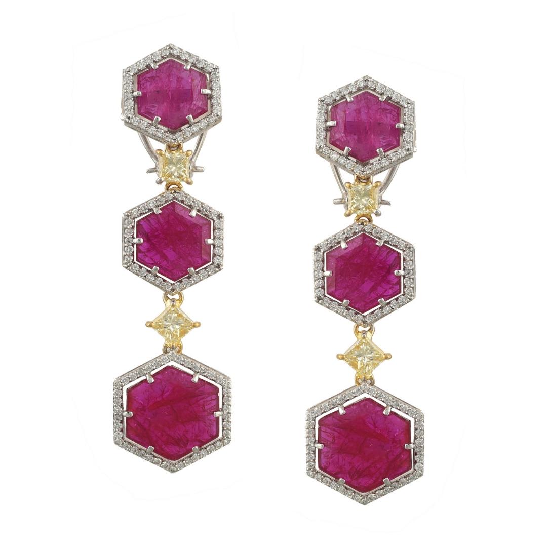 A gorgeous and very important pair of natural Mozambique Ruby and Yellow Diamond Earrings set in 18K yellow and white gold. The rubies, are flat-ish, hexagonal in shape and weighs, 20.26 carats,  and its completely no treatment - no heat also, and