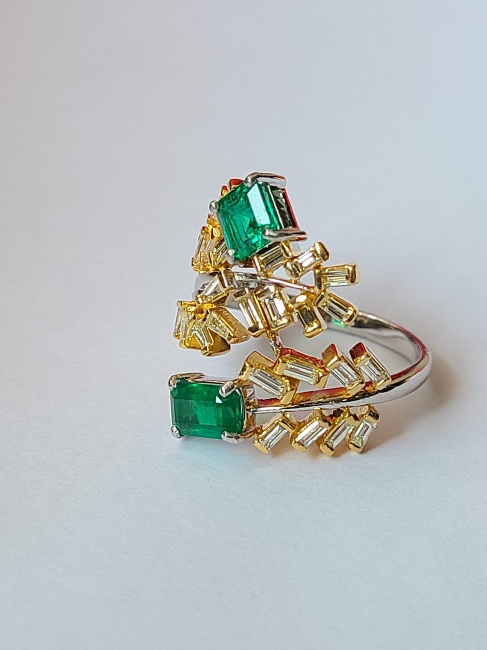A very gorgeous and one of a kind, Emerald &b Yellow Diamonds Cocktail Ring set in 18K Gold. The weight of the Emeralds is 1.27 carats. The Emeralds are of Zambian origin and are completely natural, without any treatment. The weight of the Diamonds