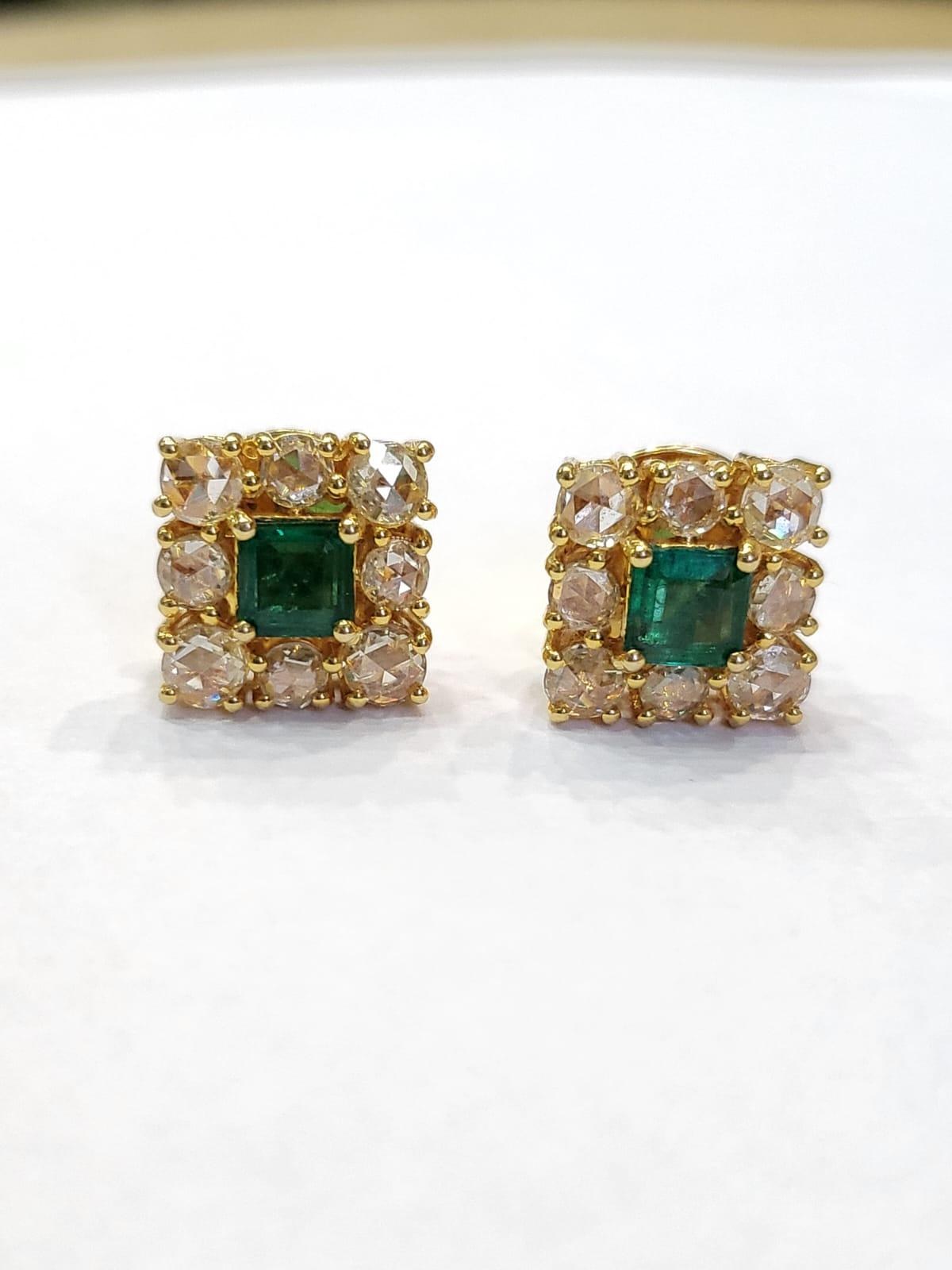 A very chic and wearable, Emerald Stud Earrings set in 18K Yellow Gold & Diamonds. The weight of the square Emeralds are 0.94 carats. The Emeralds are completely natural, without any treatment and are of Zambian origin. The weight of the Yellow Rose