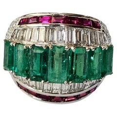 Set in 18K Gold, natural Zambian Emeralds, Rubies 
Tapered Diamonds Band Ring