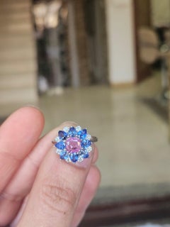 Set in 18K Gold, Pink Sapphire, Blue Sapphires & Diamonds Engagement Ring
