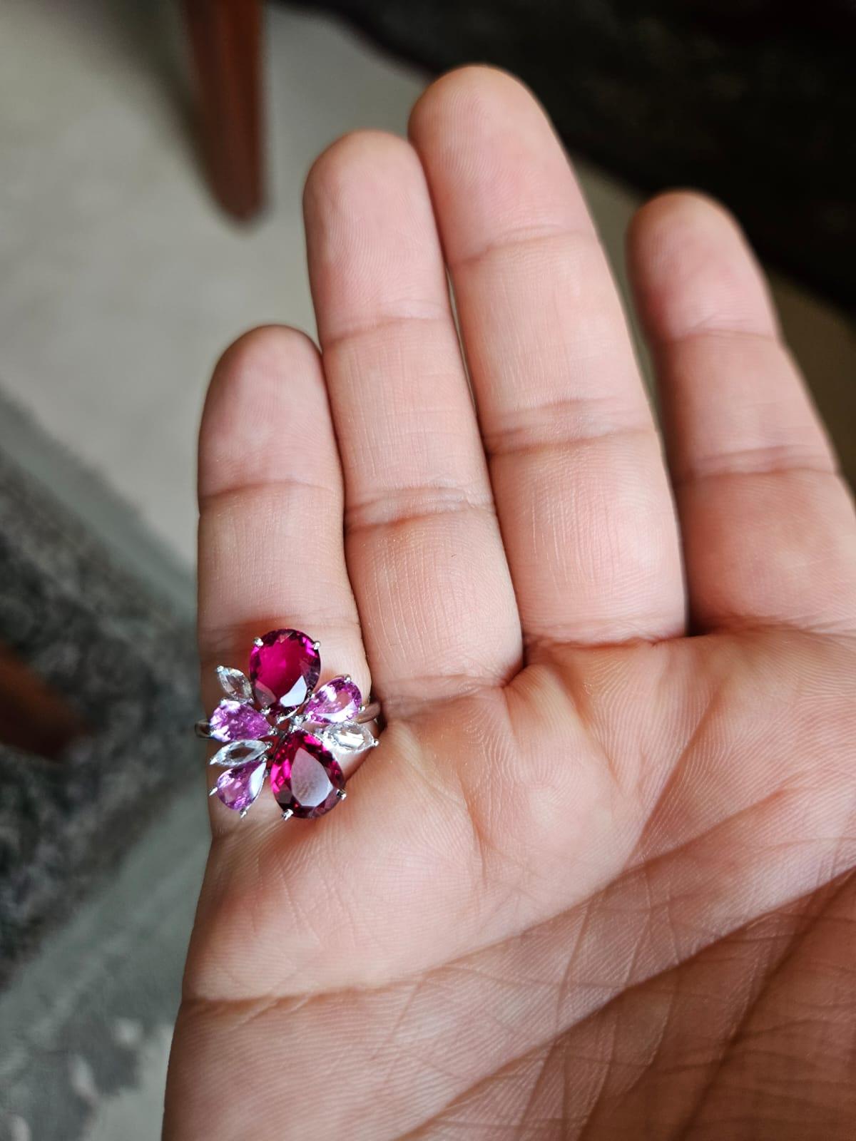 A very beautiful & gorgeous, Tourmaline & Pink Sapphire Cluster Cocktail Ring set in 18K White Gold & Diamonds. The weight of the Pink Sapphires is 1.31 carats. The Pink Sapphires are of Ceylon (Sri Lanka) origin. The weight of the Tourmalines is