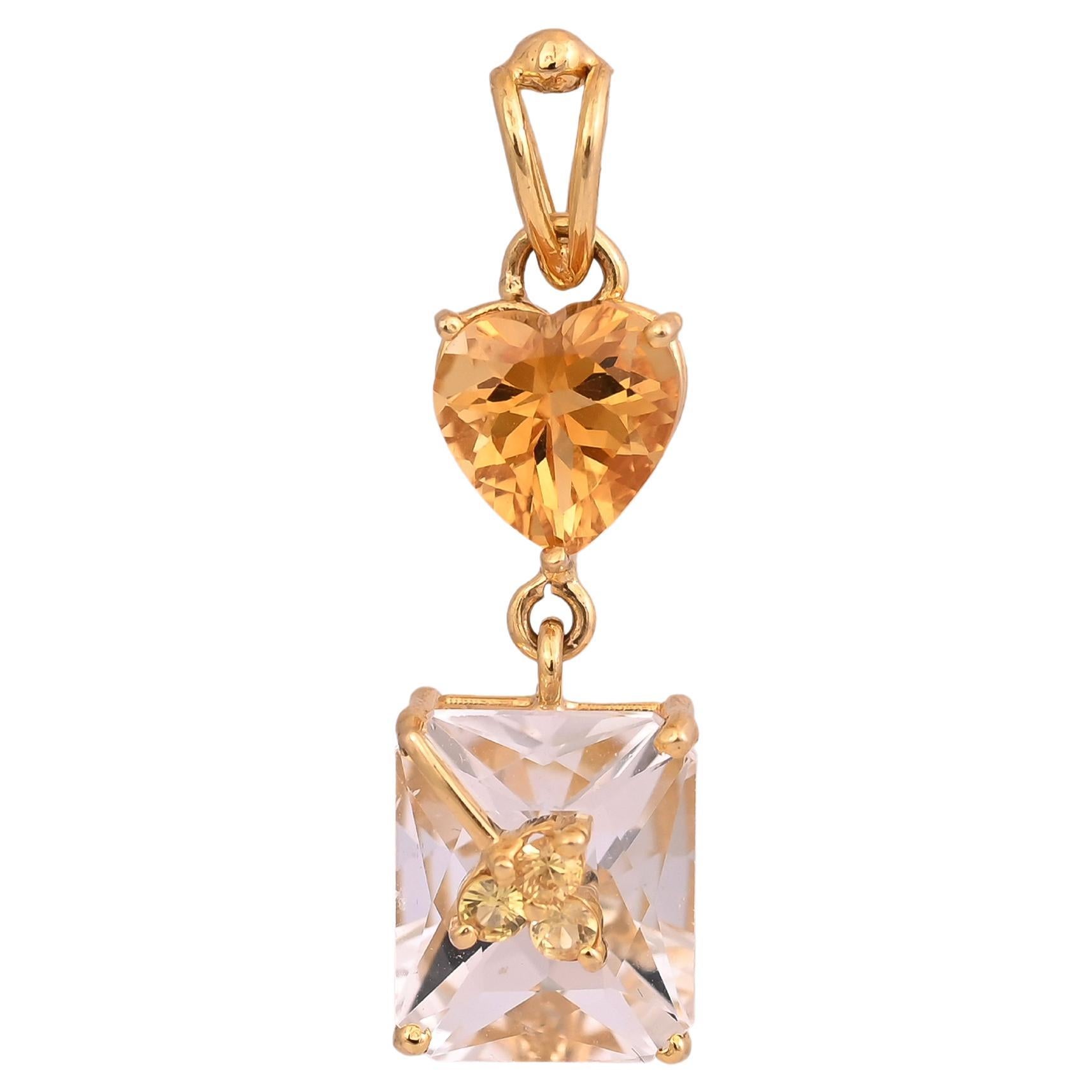 A very gorgeous and chic, Rock Crystal, Yellow Sapphire & Citrine Pendant Necklace & Earrings set crafted in 18K Yellow Gold. The weight of the Rock Crystals is 17.19 carats. The weight of the Citrine is 4.69 carats. The Yellow Sapphires weight is