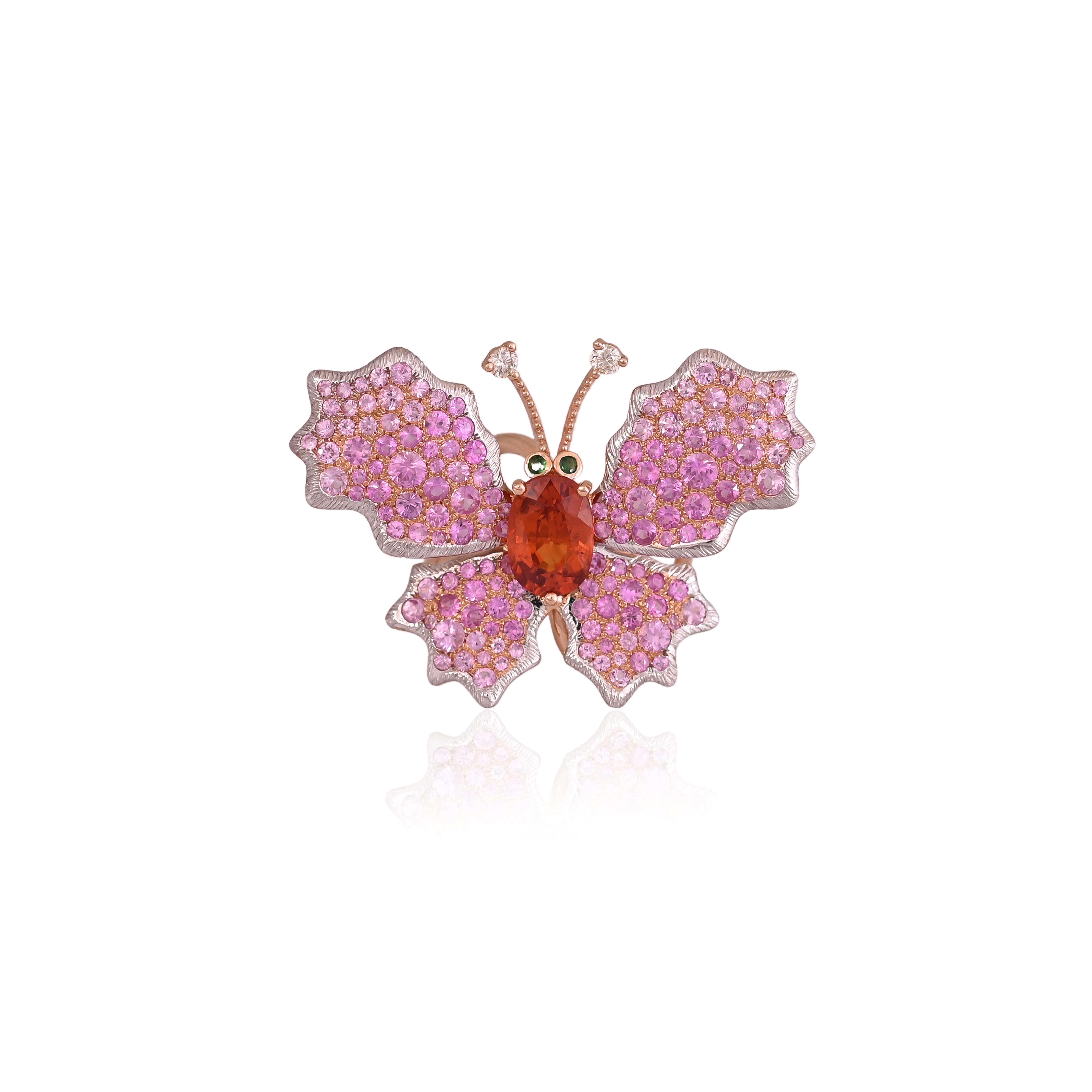 A very gorgeous and modern, Spessartite Garnett & Pink Sapphires Cocktail Ring set in 18K Rose Gold & Diamonds. The weight of the Spessatite Garnett is 3.22 carats. The Garnett is completely natural, without any treatment and is of Madagascar