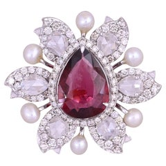 Anello di fidanzamento con tormalina, perla d'acqua dolce e diamante taglio rosa, incastonato in oro 18 carati
