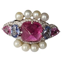 Bague en or 18 carats, tourmaline, plusieurs saphirs, perles d'eau douce et diamants