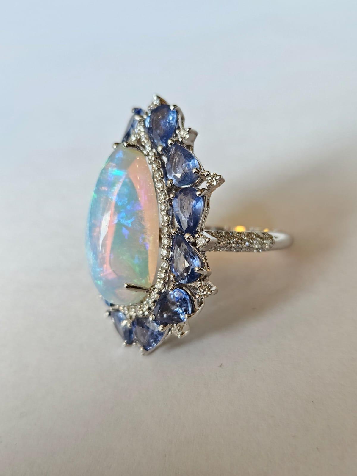 Pear Cut Set in 18K Gold, white Ethiopian Opal, Blue Sapphires & Diamonds Cocktail Ring