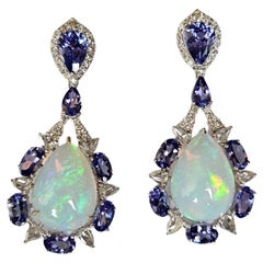 Set in 18K Gold, white Ethiopian Opal, Tanzanite
Diamonds Chandelier Earrings Set in 18K Gold, white Ethiopian Opal, Tanzanite
Diamonds Chandelier Earrings