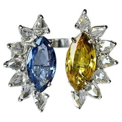 Toi et Moi-Ring aus 18 Karat Gold, gelbem und blauem Saphir und Diamanten im Rosenschliff