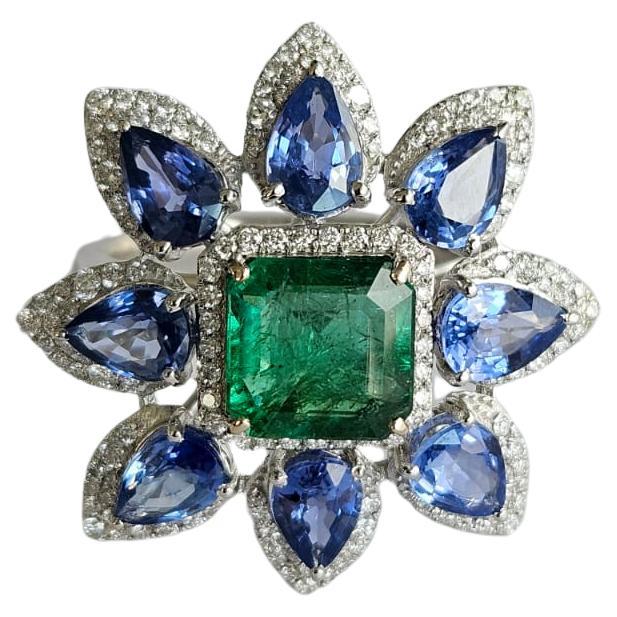 Set in 18K Gold, Zambian Emerald, Blue Sapphires & Diamonds Cocktail Ring For Sale